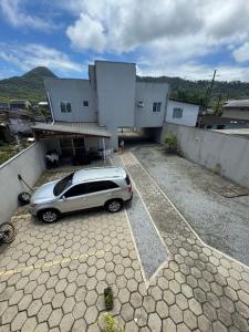 Фотография из галереи Apartamento em Matinhos aconchegante в городе Матиньюс