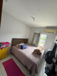 Фотография из галереи Apartamento em Matinhos aconchegante в городе Матиньюс