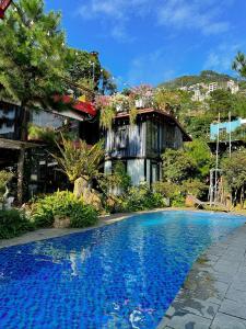 Bazén v ubytování Bách Xanh House. Nhà ống khói nebo v jeho okolí