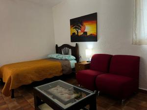 Postel nebo postele na pokoji v ubytování El Agave