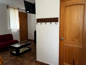 TV a/nebo společenská místnost v ubytování El Agave