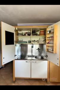 Η κουζίνα ή μικρή κουζίνα στο B&B Mapei