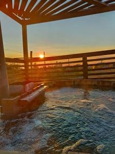 Πισίνα στο ή κοντά στο CABAÑA RAIZ INDOMITA PINTO Ñuble