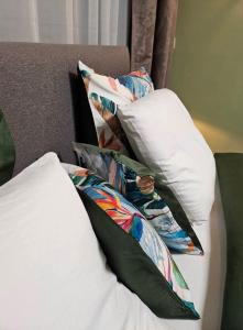 Ένα ή περισσότερα κρεβάτια σε δωμάτιο στο A Beloeil, on vous acceuille