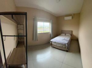 Ένα ή περισσότερα κρεβάτια σε δωμάτιο στο Essenza Loft