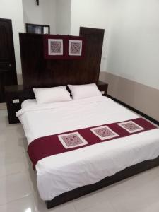 Ένα ή περισσότερα κρεβάτια σε δωμάτιο στο Le Charme Pakbeng Villa +2 φωτογραφίες