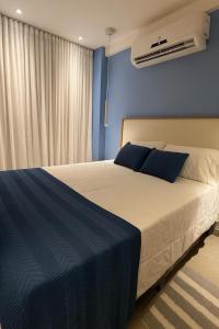 Giường trong phòng chung tại Portal dos Mares Tamandaré Carneiros - Premium +6 ảnh