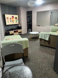 Una cama o camas en una habitación de Portuito Residences