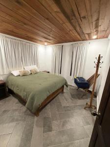 Кровать или кровати в номере Cabañas lindo amanecer