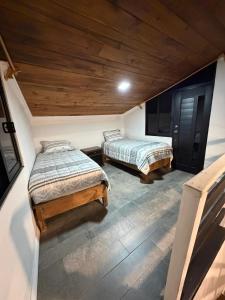 Кровать или кровати в номере Cabañas lindo amanecer