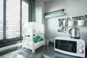 Una cocina o cocineta en Spring Vintage Pool Villa บ้านส่วนตัวทั้งหลัง กรุณาระบุผู้เข้าพัก