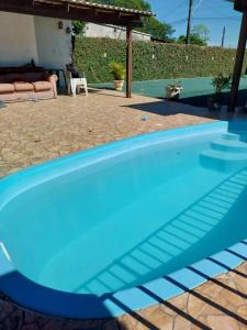 Swimmingpoolen hos eller tæt på Descanso perfeito em São Gabriel