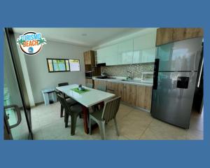 Kuchyň nebo kuchyňský kout v ubytování Palmares Beach