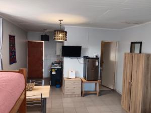 TV/trung tâm giải trí tại Hostal ribera de Quitor