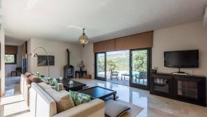 Et tv og/eller underholdning på Villa Rural Zen by Hacienda Alfacara