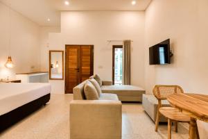 Μια τηλεόραση ή/και κέντρο ψυχαγωγίας στο Lala Panzi Villa Managed by Manara