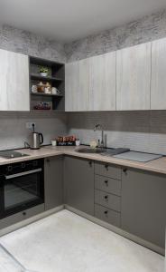 Kuchyň nebo kuchyňský kout v ubytování Apartman Elite Stay Doboj