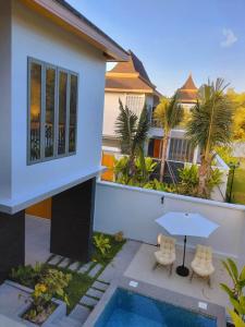 Φωτογραφία από το άλμπουμ του Golden Andes 豪华度假别墅 σε Ban Mut Dok Khao