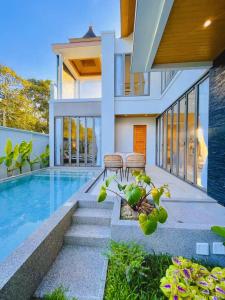 Φωτογραφία από το άλμπουμ του Golden Andes 豪华度假别墅 σε Ban Mut Dok Khao