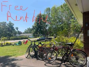 a group of bikes parked next to a building at Cozy Small Room - Queen bed - Free Parking in Charlottetown in Charlottetown