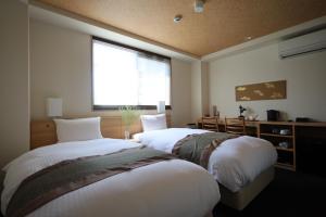 Una cama o camas en una habitación de Excellent Hotel - Vacation STAY 50210v