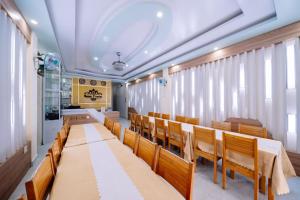 a room with a row of chairs and a table at Seoul Hotel Cat Ba in Cat Ba +16 photos