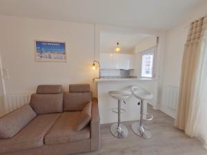 Posezení v ubytování Charmant studio au calme près du centre des Rousses pour 3 personnes - FR-1-834-17