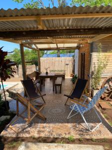 En terrasse eller udendørsområde på Cabaña Don floricel