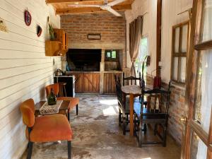 Et tv og/eller underholdning på Cabaña Don floricel