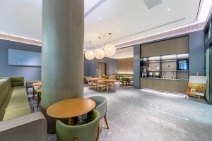 Un lugar para sentarse en JI Hotel Shanghai Wuning Road Subway Station (formerly Changshou Road Yaxin Plaza Branch)