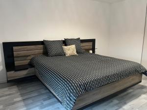 Giường trong phòng chung tại Maison cosy 6 pers Proche Europa-Park