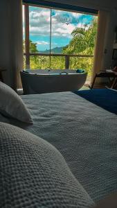 Una cama o camas en una habitación de Cabana nas Montanhas Capixabas 37 fotos más