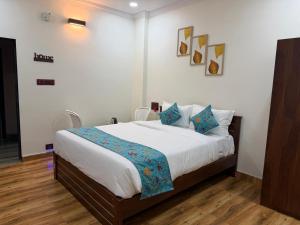 Ένα ή περισσότερα κρεβάτια σε δωμάτιο στο RB Resorts