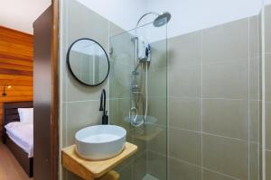 a bathroom with a sink and a mirror at Villa Primor madawan Koh Phangan in Wok Tum +17 photos