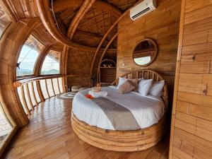 Ένα ή περισσότερα κρεβάτια σε δωμάτιο στο The Sky Nest