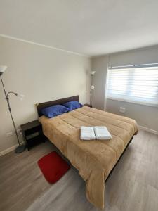 Ένα ή περισσότερα κρεβάτια σε δωμάτιο στο Departamento 2D y 2B New Cycle