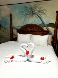 Ένα ή περισσότερα κρεβάτια σε δωμάτιο στο Walk-out Beachfront Condo - Surfer's Paradise