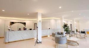 Posezení v ubytování The Room Hotel