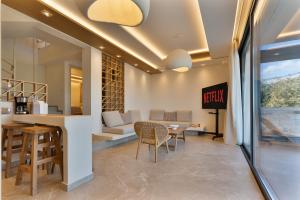 Μια τηλεόραση ή/και κέντρο ψυχαγωγίας στο Green Sea Villas