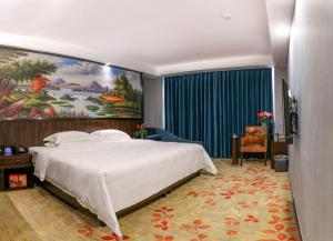 Postel nebo postele na pokoji v ubytování Centenio International Hotel + 210 fotografií