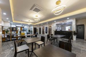 En restaurant eller et andet spisested på Gunsan The City Hotel