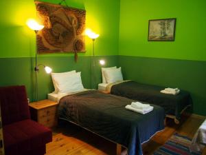 Postel nebo postele na pokoji v ubytování Guest Accommodation Etno Konak Tašana