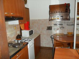 Kuchyň nebo kuchyňský kout v ubytování Marija Rooms & Apartments