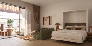 Un dormitorio con una cama blanca y una silla verde. en Hyde Perth, en Perth