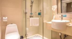 Ένα μπάνιο στο City Comfort Inn Liuzhou Sanjiang Gulou Bird's Nest