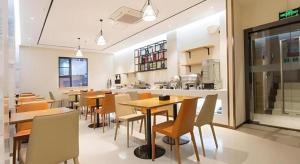 Η κουζίνα ή μικρή κουζίνα στο City Comfort Inn Liuzhou Sanjiang Gulou Bird's Nest +29 φωτογραφίες