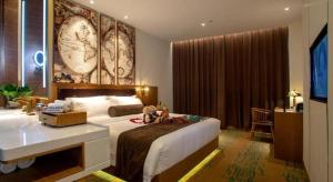 Ένα ή περισσότερα κρεβάτια σε δωμάτιο στο James Joyce Coffetel· Wuhan Wangjiawan Taojialing Metro Station +21 φωτογραφίες