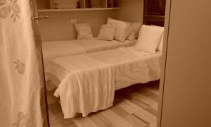 Postel nebo postele na pokoji v ubytování Milano B&B
