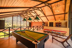 a billiard room with a pool table at Rosewood Manor in Botiyatenna