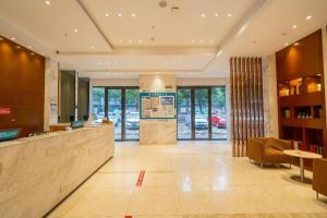 Ο χώρος του λόμπι ή της ρεσεψιόν στο City Comfort Inn Wuhan Qingshan Jianshi Qingyiju Metro Station